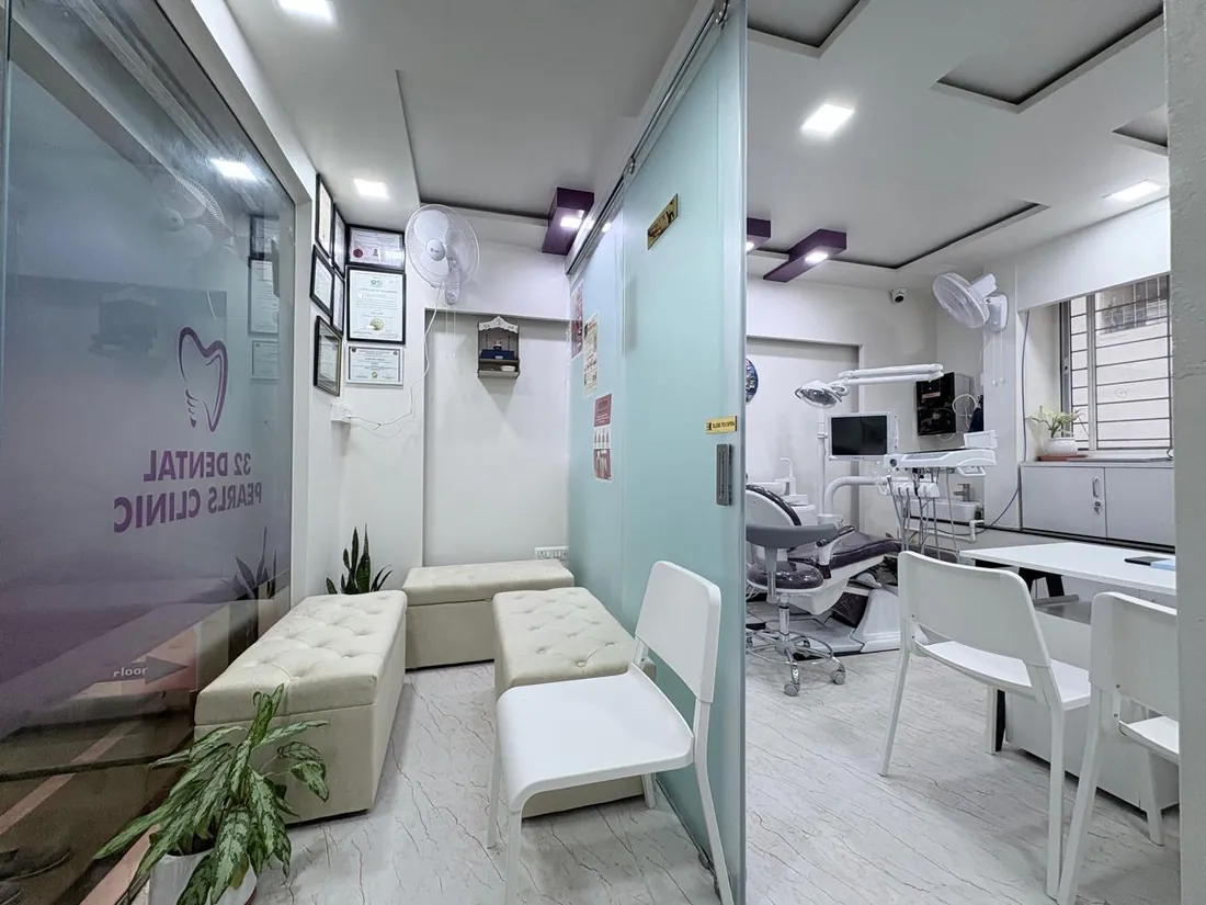 Modern dental treatment room with dental chair at 32 Dental Pearls Clinic
